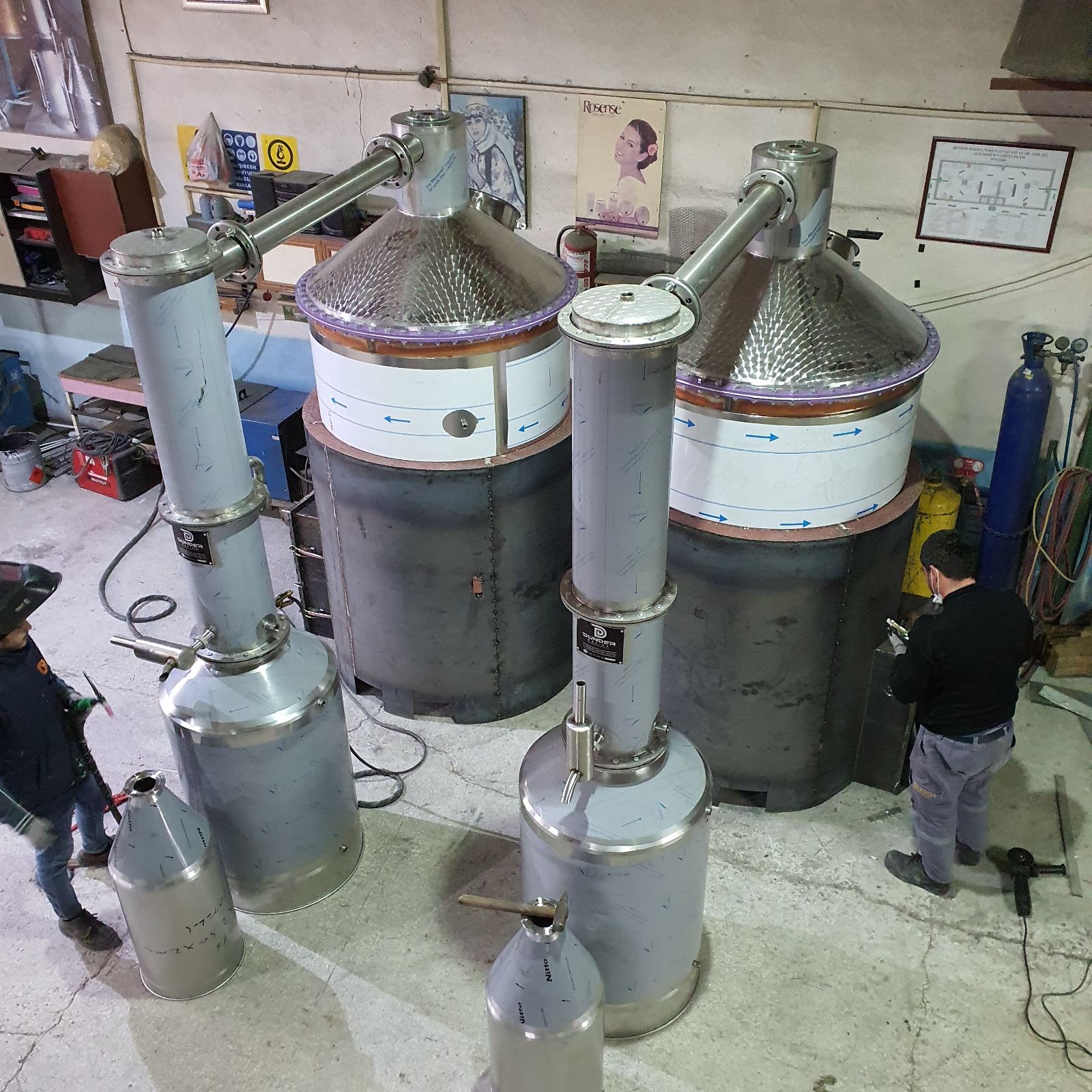 Insulated stainless steel distillation stills with condensers and oil separators