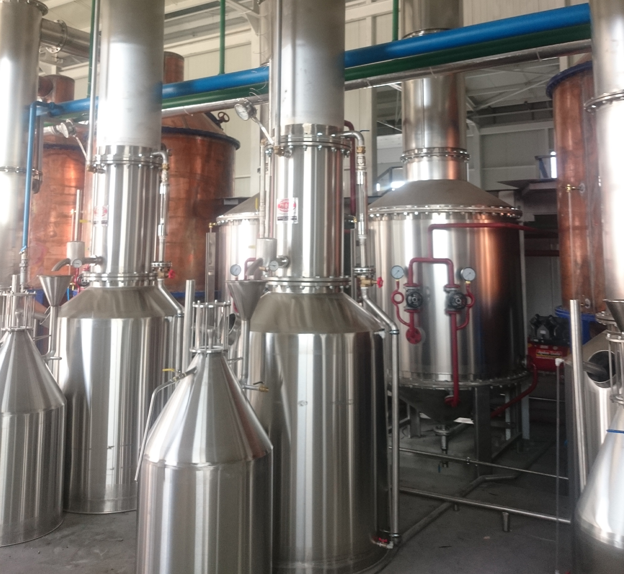 Copper and stainless steel essential oil distillation stills with condenser columns