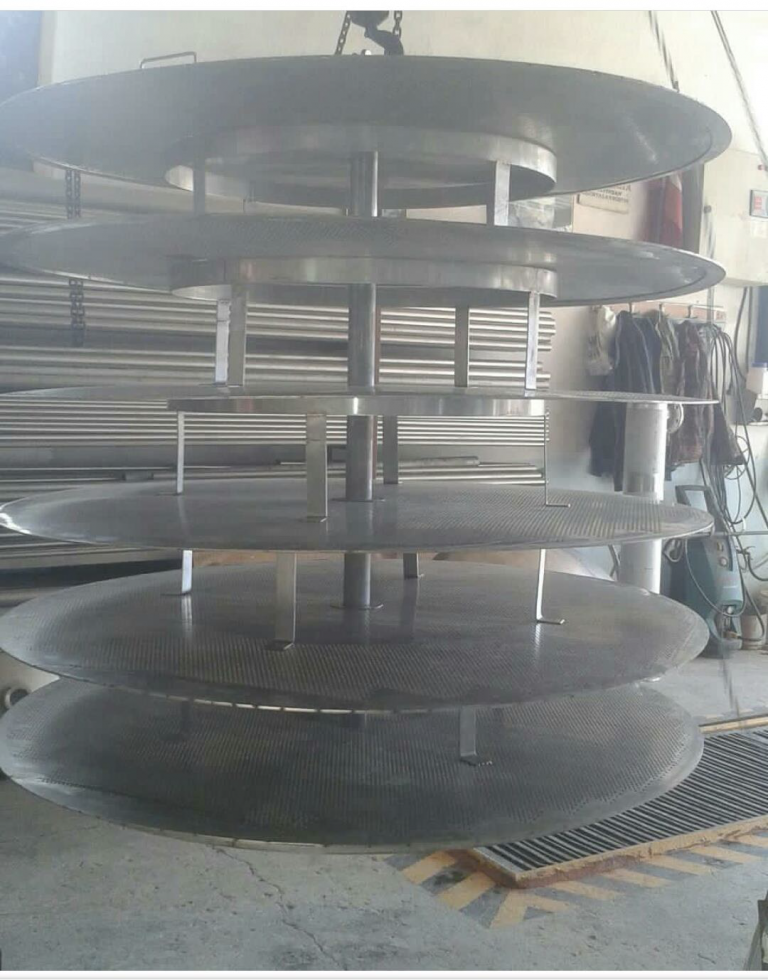 Stack of perforated stainless steel baskets for a static basket extractor