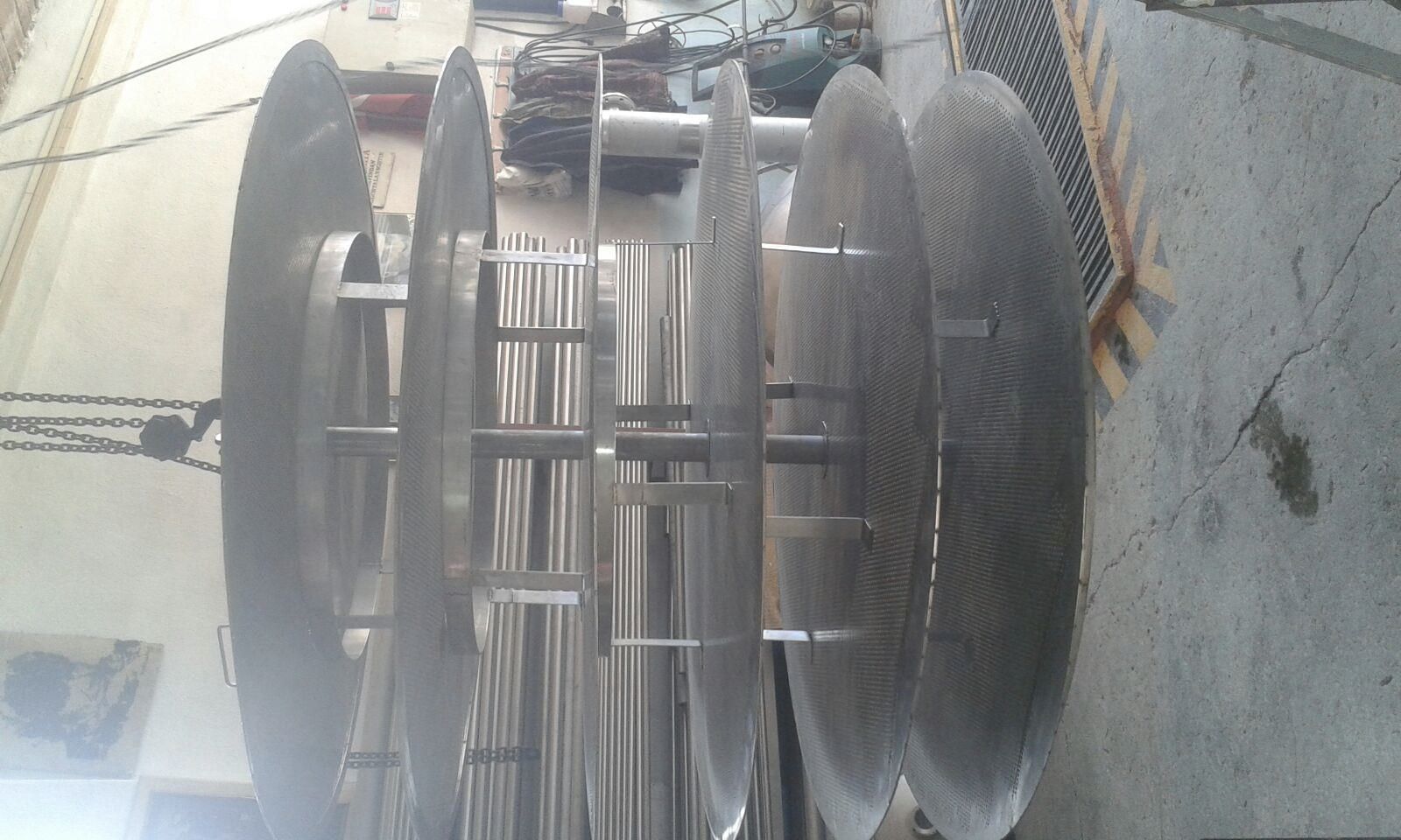 Stainless steel basket extractor tray stack ready for loading