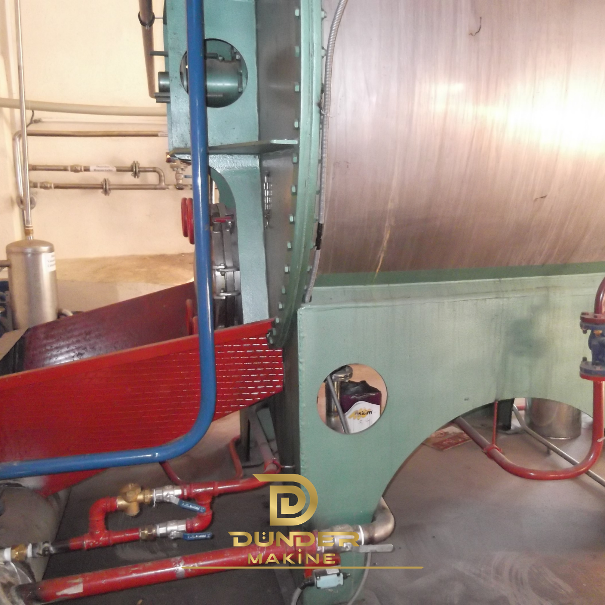 Sistema de extracción rotativa industrial con tambor y accionamiento, Dünder Makine