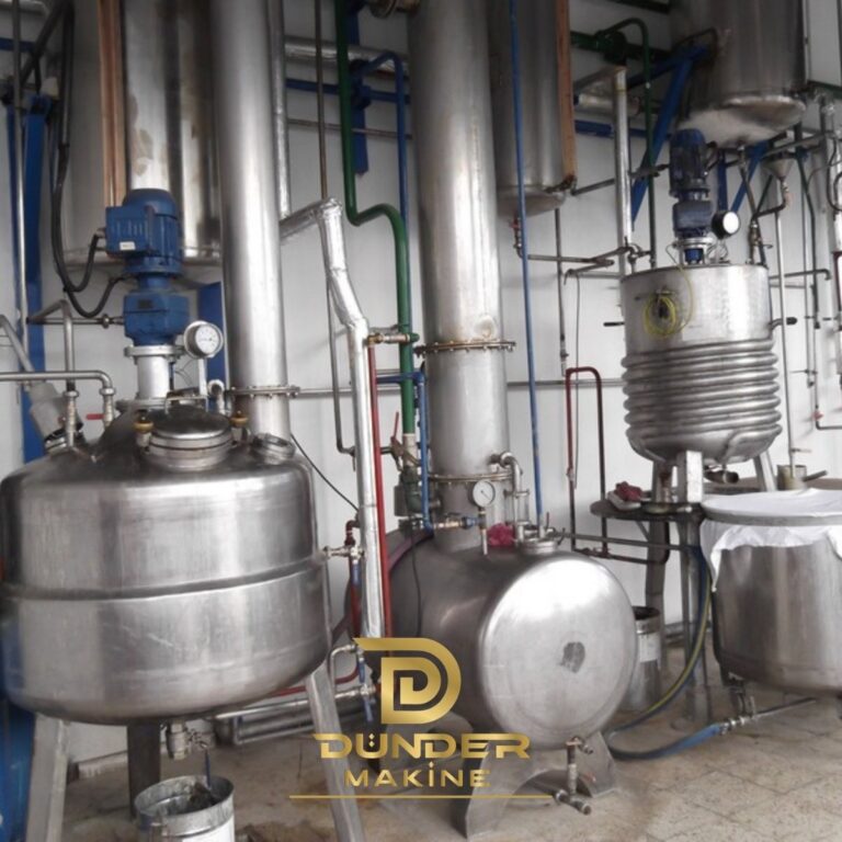 Absolute production unit with mixing tank, agitator, coil-heated vessel and evaporator by Dünder Makine