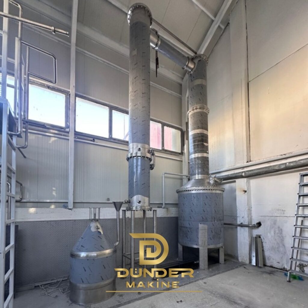 Cohobation unit with tall stainless steel columns and separator for hydrosol redistillation by Dünder Makine