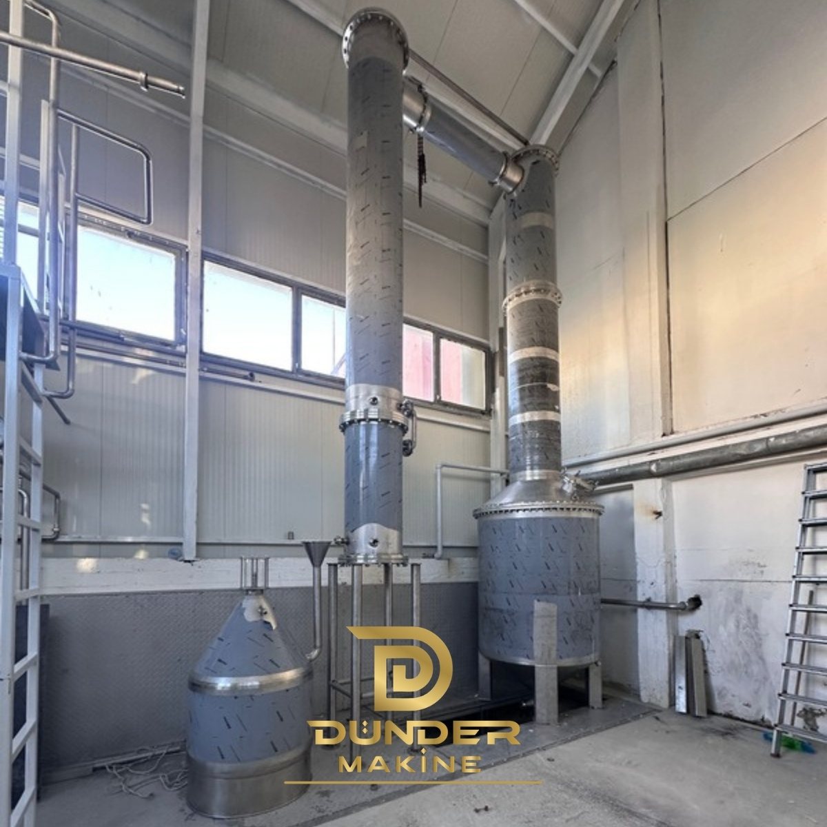 Cohobation unit with tall stainless steel columns and separator for hydrosol redistillation by Dünder Makine