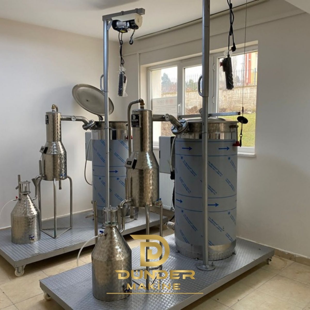 Electric portable essential oil distillation unit on a mobile frame